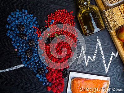 Summer harvest and salmon fish, food for brain, heart, rich in antioxidants, fiber and vitamins Stock Photo