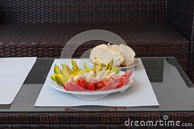 Summer healthy snack served on outdoor porch table Stock Photo