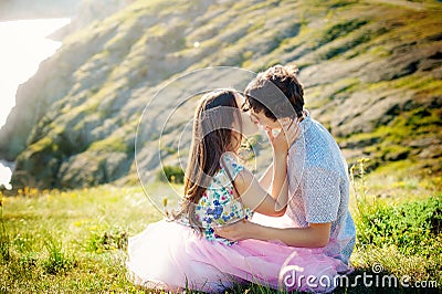 Summer holidays love relationship and dating concept - romantic playful couple flirting on sea shore Stock Photo