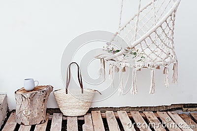 Summer hygge concept with hammock chair in the garden Stock Photo