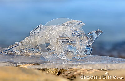 Summer ice on the lake Baikal at sunrise Stock Photo