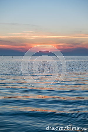 Summer landscape beautiful bronze sunset over the sea Stock Photo