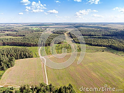 Summer landscape scene. green fields, country roads and forests Stock Photo