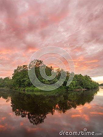 Summer landscape scenic fiery sunset over calm river Stock Photo