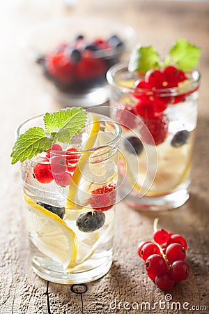 Summer lemonade with berry and lemon Stock Photo