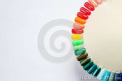 Summer manicure and nail color samples. multicolored manicure and collection of color nail polish samples. Nail beauty Stock Photo