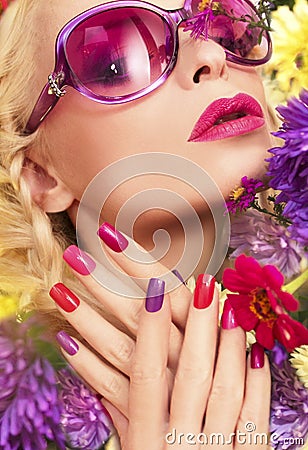 Summer manicure with purple asters Stock Photo