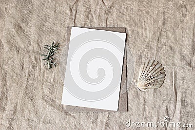 Summer marine, wedding stationery, desktop mock-up scene. Blank greeting cotton paper card, craft envelope, seashells Stock Photo