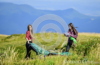 Summer mood. family camping. reach destination place. hiking outdoor adventure. mountain tourism camp. two girls pitch Stock Photo