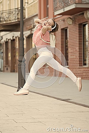 Summer music chart. Kid long hair enjoy walk with favorite song. Music drives her life. Time to move your body. Summer Stock Photo