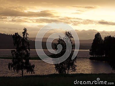 Summer night in north Sweden by a lake Stock Photo