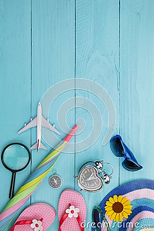 Summer objects of beautiful summer accessory on blue wooden background Stock Photo