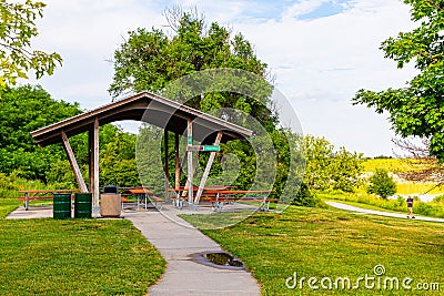 Summer in Omaha, A shelter with tables and benches at Ed Zorinsky Lake Park Omaha NE Stock Photo