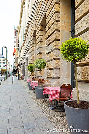 Summer outdoor area of the restaurant. Sidewalk tables Editorial Stock Photo