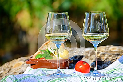 Summer picnic or wine tasting of white wine on vineyards in Lazio, Italy Stock Photo