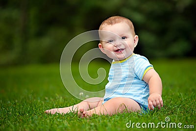 Summer portrait of happy baby boy infant outdoors Stock Photo