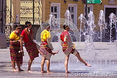 Summer Refreshment At City Fountain Editorial Stock Photo