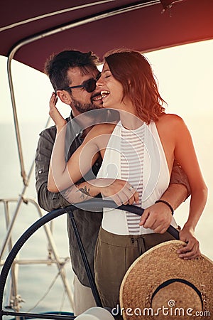 Summer romance on vacation - couple on the luxury boat enjoy Stock Photo