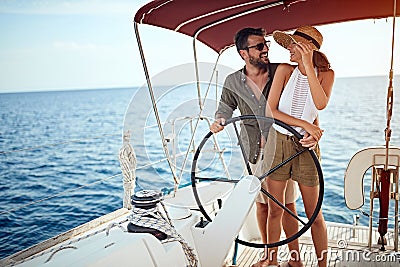 Summer romance on vacation - couple on the luxury boat Stock Photo