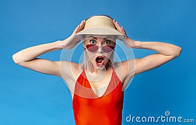 Summer Sale. Shocked Millennial Girl In Swimsuit Touching Head In Amazement Stock Photo