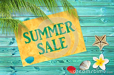 Summer sale written on yellow sign, blue wooden planks, seashells, palm tree background Stock Photo