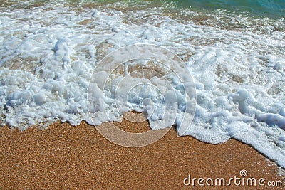 Summer seascape - wave with clear water and foam Stock Photo