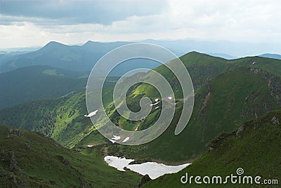Summer snow in mountains Stock Photo