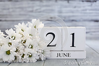 Summer Solstice June 21st Calendar Blocks with White Daisies Stock Photo