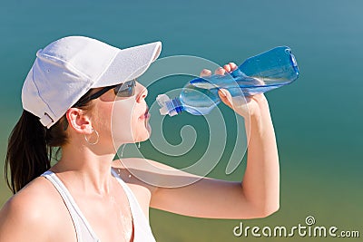 Summer sport fit woman drink water bottle Stock Photo