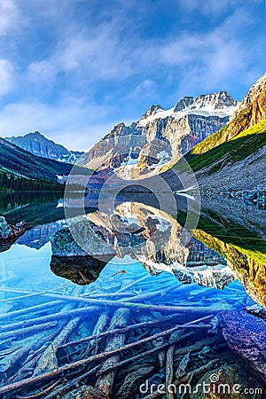 Summer staycation discovery at Consolation Lake with visible glacier on Mount Quadra, Alberta, Canada Stock Photo