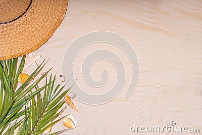 Summer sunny sand background with straw hat Stock Photo