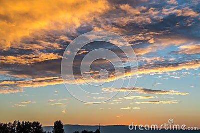 Summer sunrise morning clouds in dramatic view Stock Photo