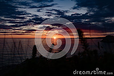 Summer sunset at Lindesnes lighthouse in Norway. Stock Photo