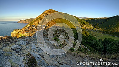 Summer sunset over the Valley of Rocks, near Lynton in the Exmoor National Park, Devon, UK Stock Photo