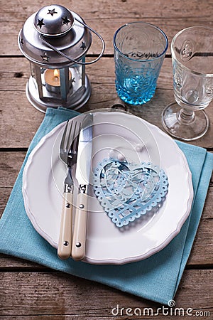 Summer table setting. Decorative heart, knife and fork on white Stock Photo