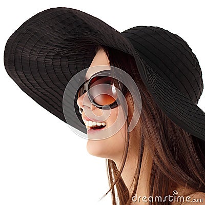 Summer teen girl cheerful in panama and sunglasses Stock Photo