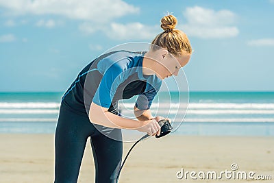 Summer time and active rest concept. Young surfer woman beginner Stock Photo