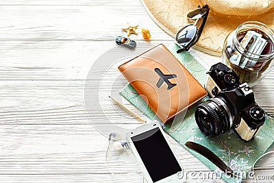 Summer travel wanderlust concept, space for text. map camera sun Stock Photo