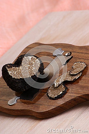 summer truffle on a truffle slicer Stock Photo