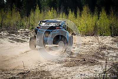 Summer UTV, ATV & offroad driving in dust. Quad racing Editorial Stock Photo