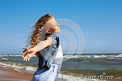 Summer vacation concept.Happy child against blue sky background Stock Photo