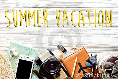 summer vacation text, time to travel concept, wanderlust vacation background flat lay. camera sunglasses passport money map phone Stock Photo