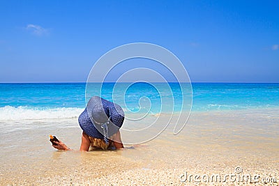 Summer vacation woman on beach Stock Photo