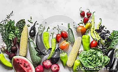 Summer vegetables harvest background. Organic garden vegetables, berries, fruit on a light background, top view Stock Photo