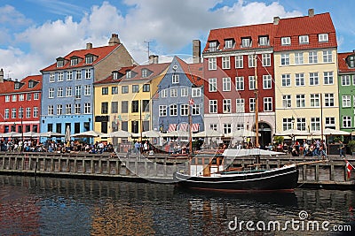 Summer view of Nyhavn pier with color buildings i ships, in the Old Town of Copenhagen Editorial Stock Photo