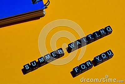 Summer waiting for you on wooden blocks. business concept on orange background Stock Photo