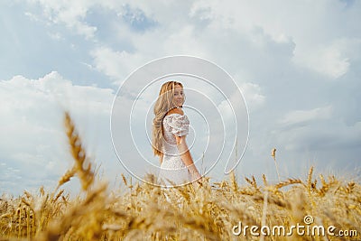 Summer woman portrait in rural countryside in wheat field Stock Photo