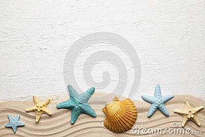 Summertime background - seashells, beach sand and plastered background Stock Photo
