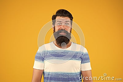 Summertime is the best. Ocean cruise. bearded man hipster yellow wall. mature brutal guy with beard. male style Stock Photo