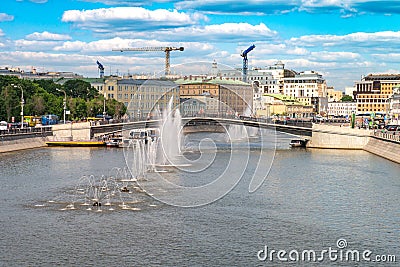 Summertime cityscape in the capital of Russia Moscow. Fountains in river Moscow Editorial Stock Photo